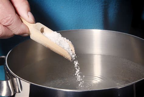 Why do chefs add salt to boiling water?