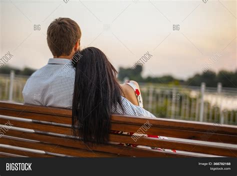 Why do couples sit side by side?