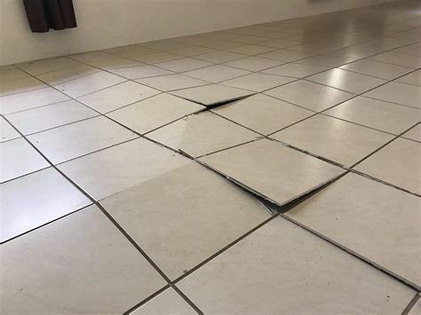 Why do floor tiles suddenly crack?