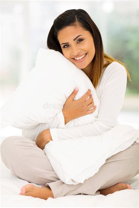 Why do girls hug pillows?