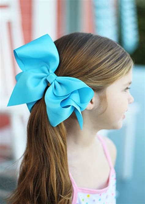 Why do girls wear a bow in their hair?