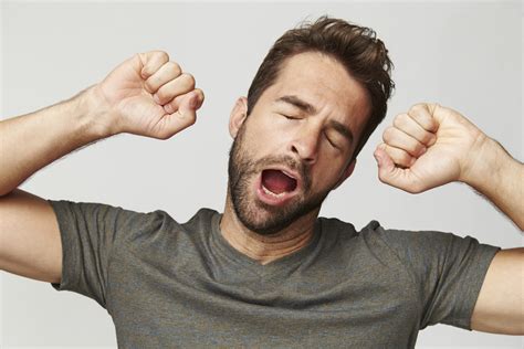 Why do guys fake yawn?