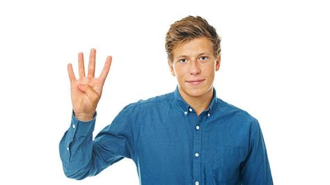 Why do guys hold up 4 fingers in pictures?