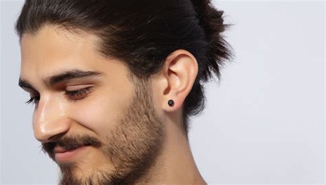 Why do guys only pierce one ear?