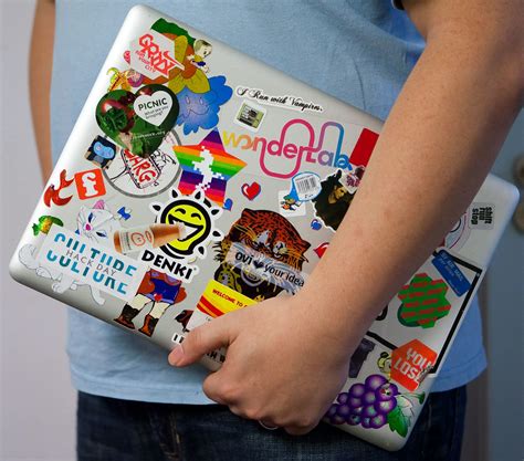 Why do hackers have stickers on their laptops?