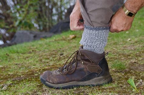 Why do hikers tuck their pants into their socks?