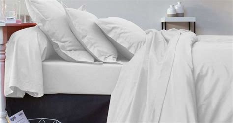 Why do hotels choose white sheets?