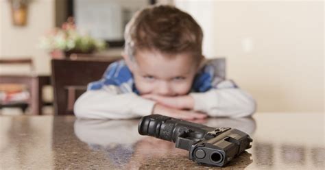 Why do little boys love guns?