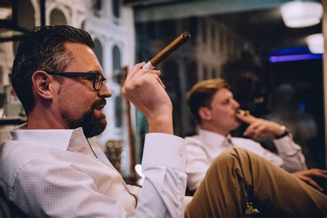 Why do men like to smoke cigars?