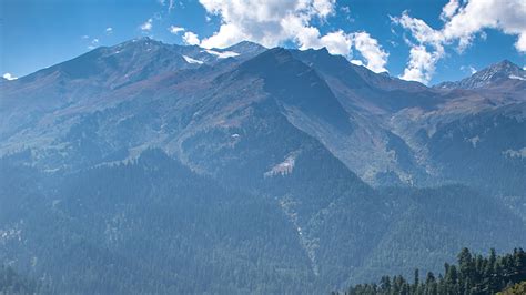 Why do mountains look blue and purple?