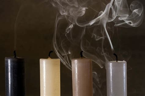 Why do my candles smoke?