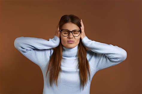 Why do my glasses hurt behind my ears?
