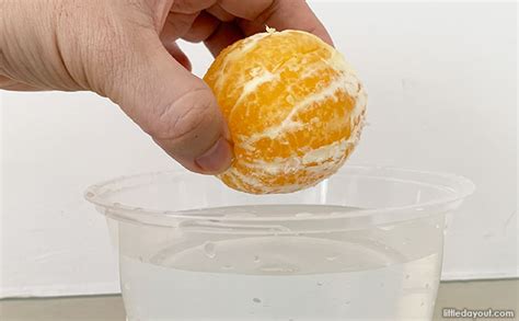 Why do peeled oranges sink?