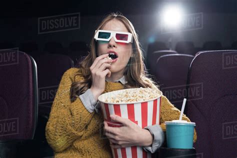 Why do people eat popcorn during movies?