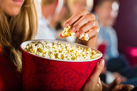 Why do people eat popcorn in cinemas?