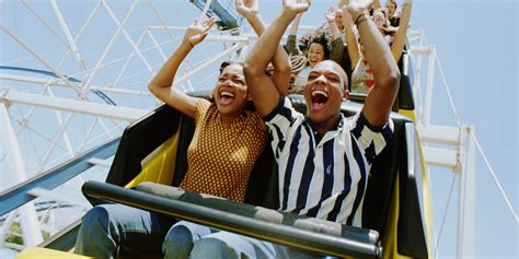 Why do people feel a rush when riding roller coasters?