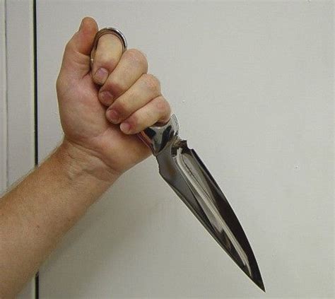 Why do people hold daggers upside down?