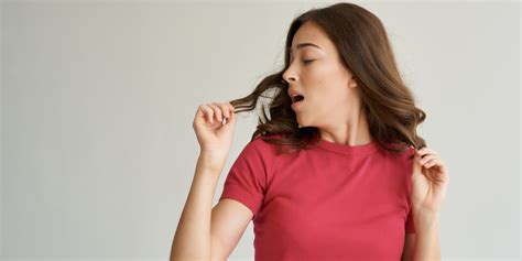 Why do people smell burning hair before a stroke?