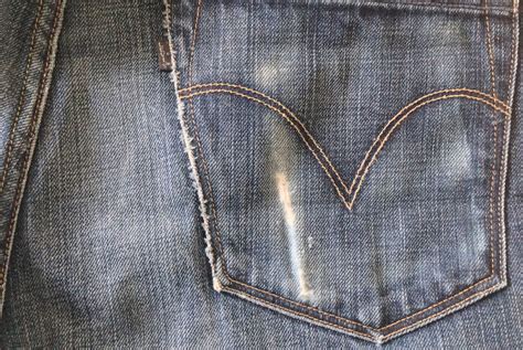 Why do people wear faded jeans?