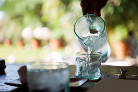 Why do restaurants serve ice cold water?