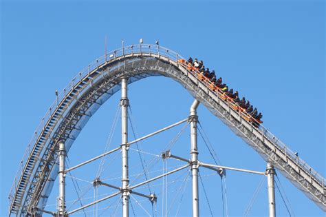 Why do roller coasters stop mid ride?