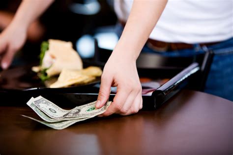 Why do waiters tip out?