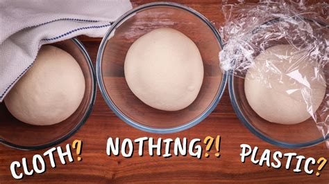 Why do you cover dough with a wet towel?