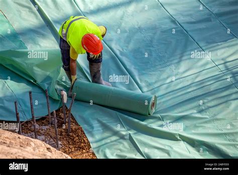 Why do you put plastic down before pouring concrete?