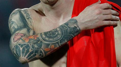 Why does Messi have a Thiago tattoo?