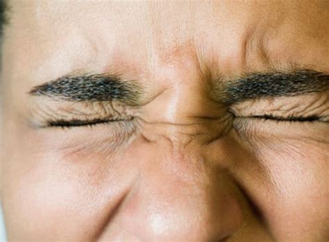 Why does my left eye hurt when I blink?
