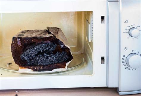 Why does my microwave smell like burning plastic?