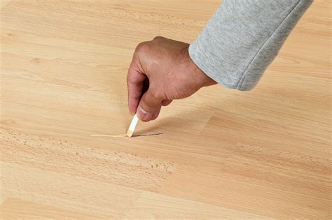 Why does my vinyl floor scratch so easily?