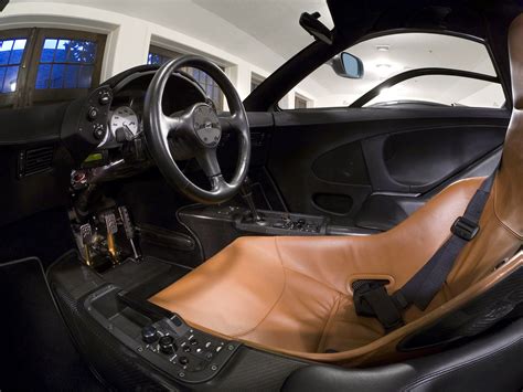 Why does the McLaren F1 have 3 seats?
