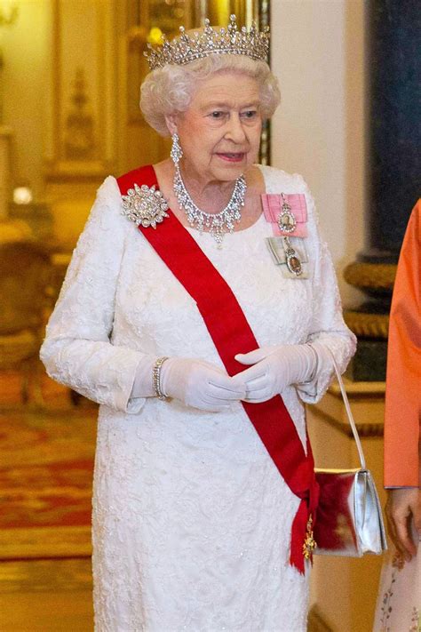 Why does the Queen wear red?