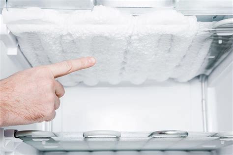 Why does the inside of my fridge keep icing up?