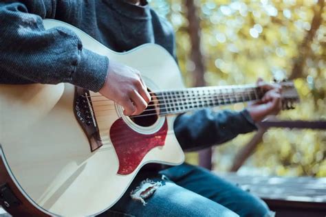 Why is it so hard to play acoustic guitar?