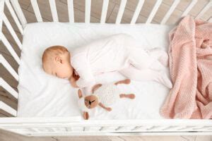 Why should babies sleep flat?