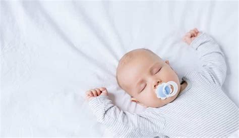 Why should babies sleep on a firm mattress?