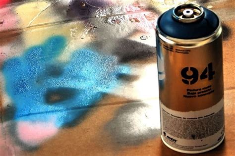 Will acetone remove spray paint from metal?