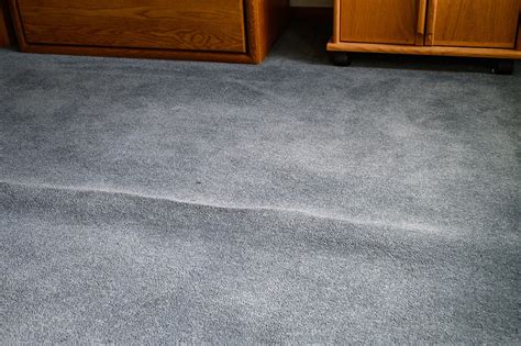 Will creases come out of new carpet?