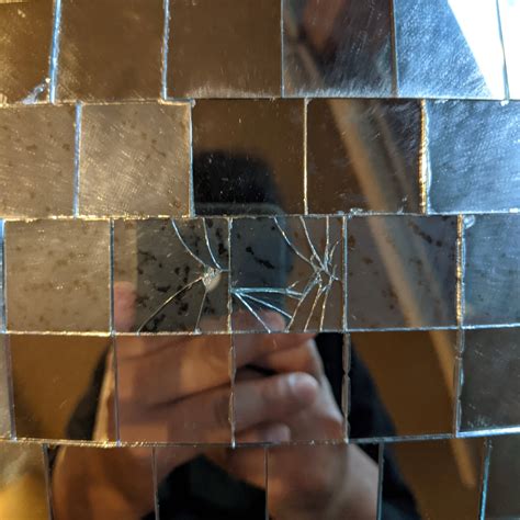 Will hot glue crack a mirror?