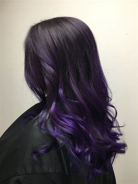 Will purple dye show on black hair?